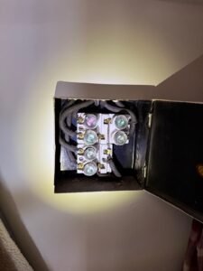 Open electrical box with multiple wire terminations in an older residential wiring setup