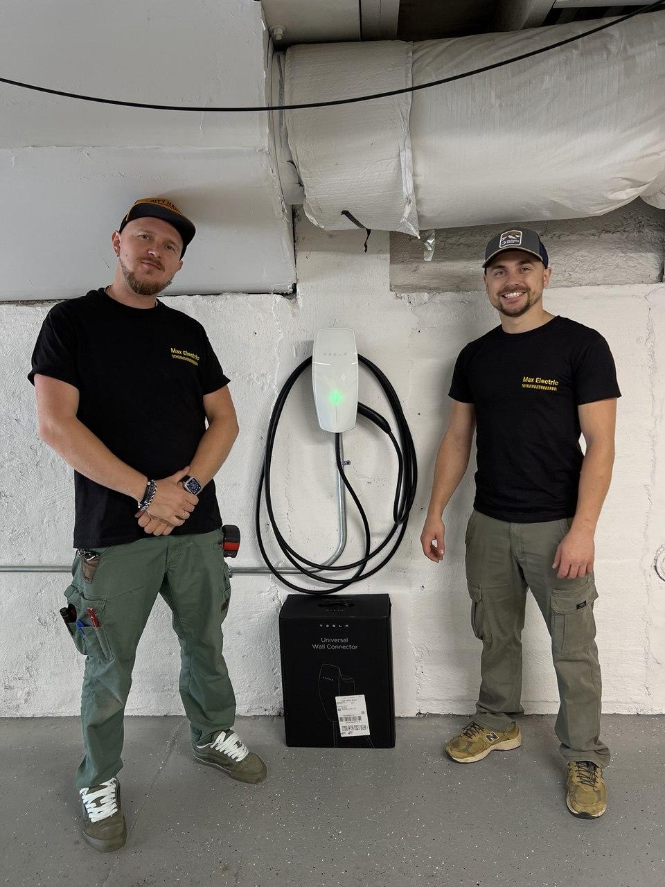 Max Electric team standing next to completed EV charger installation