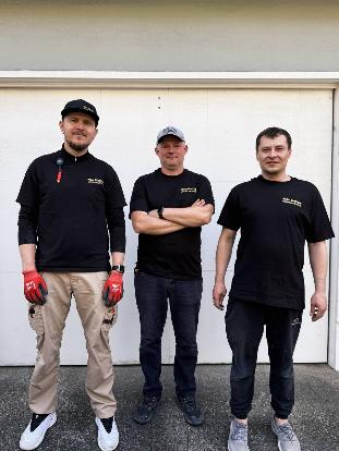 Max Electric crew posing together on a job site