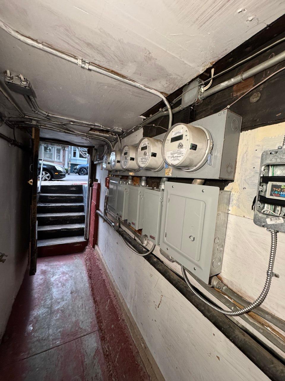 Additional view of multiple unit electrical panel replacement project