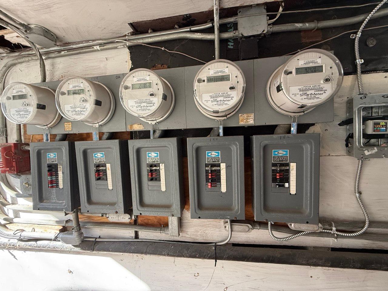Original Federal Pacific panels in multiple unit home before replacement