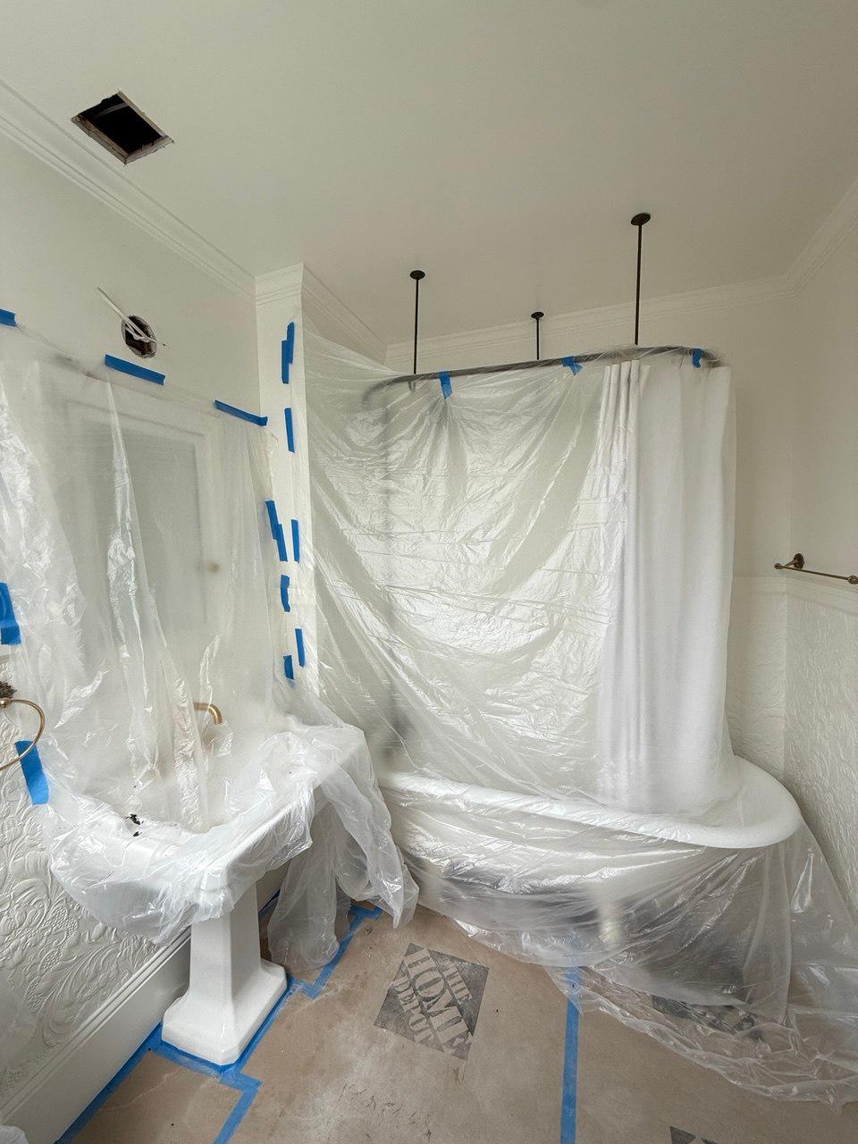 Protected bathroom area during full house rewiring project