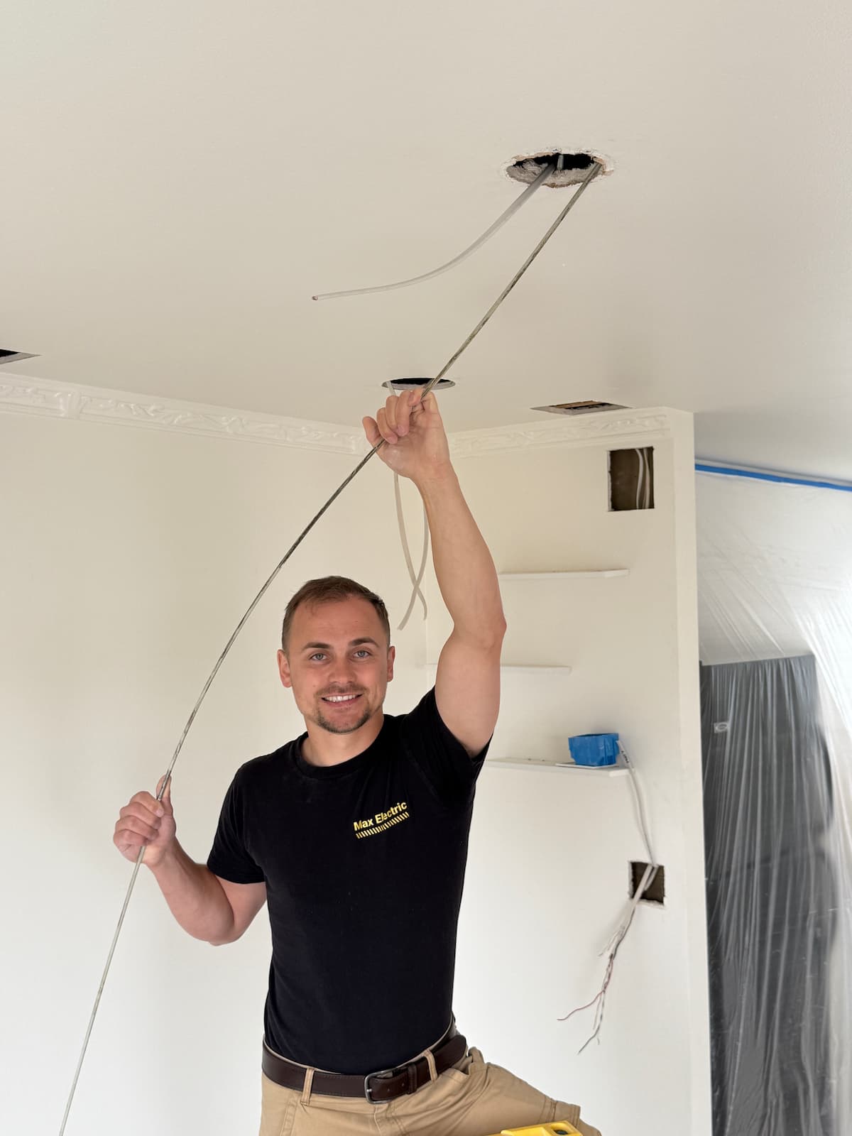 MaxElectric electrician replacing old knob and tube wiring in a San Francisco home