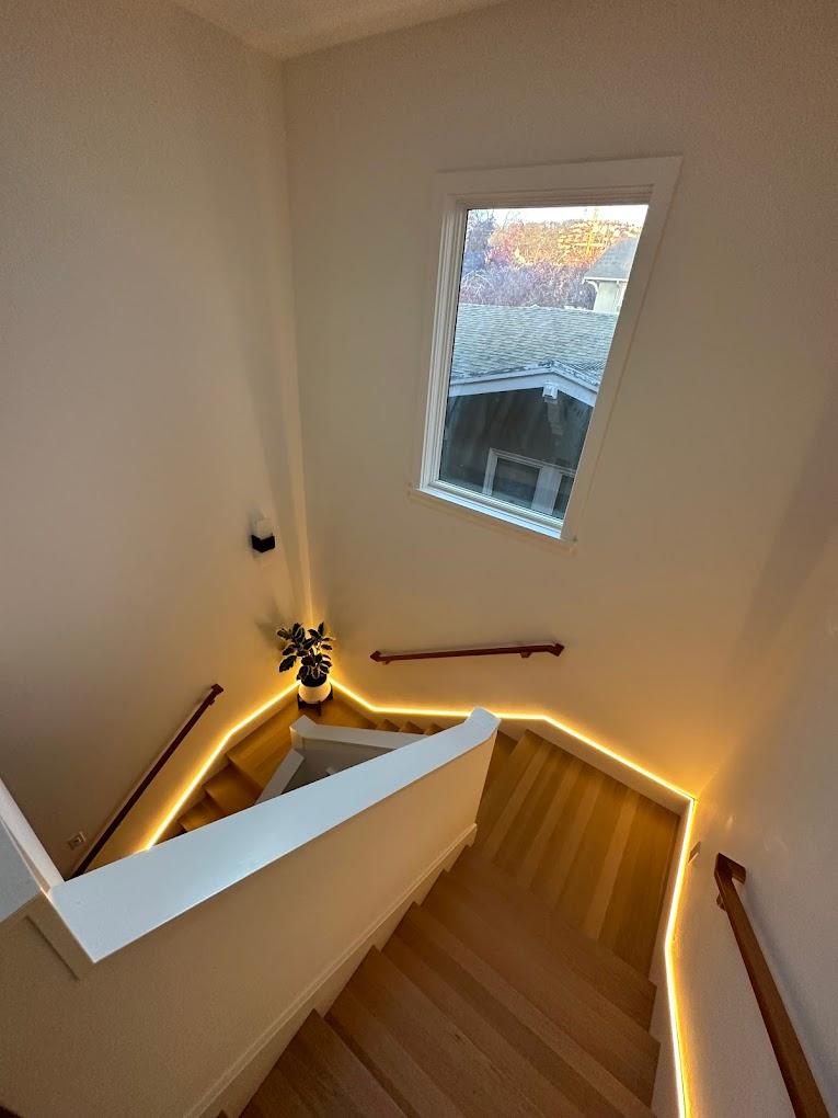 LED stair lighting installation in modern home