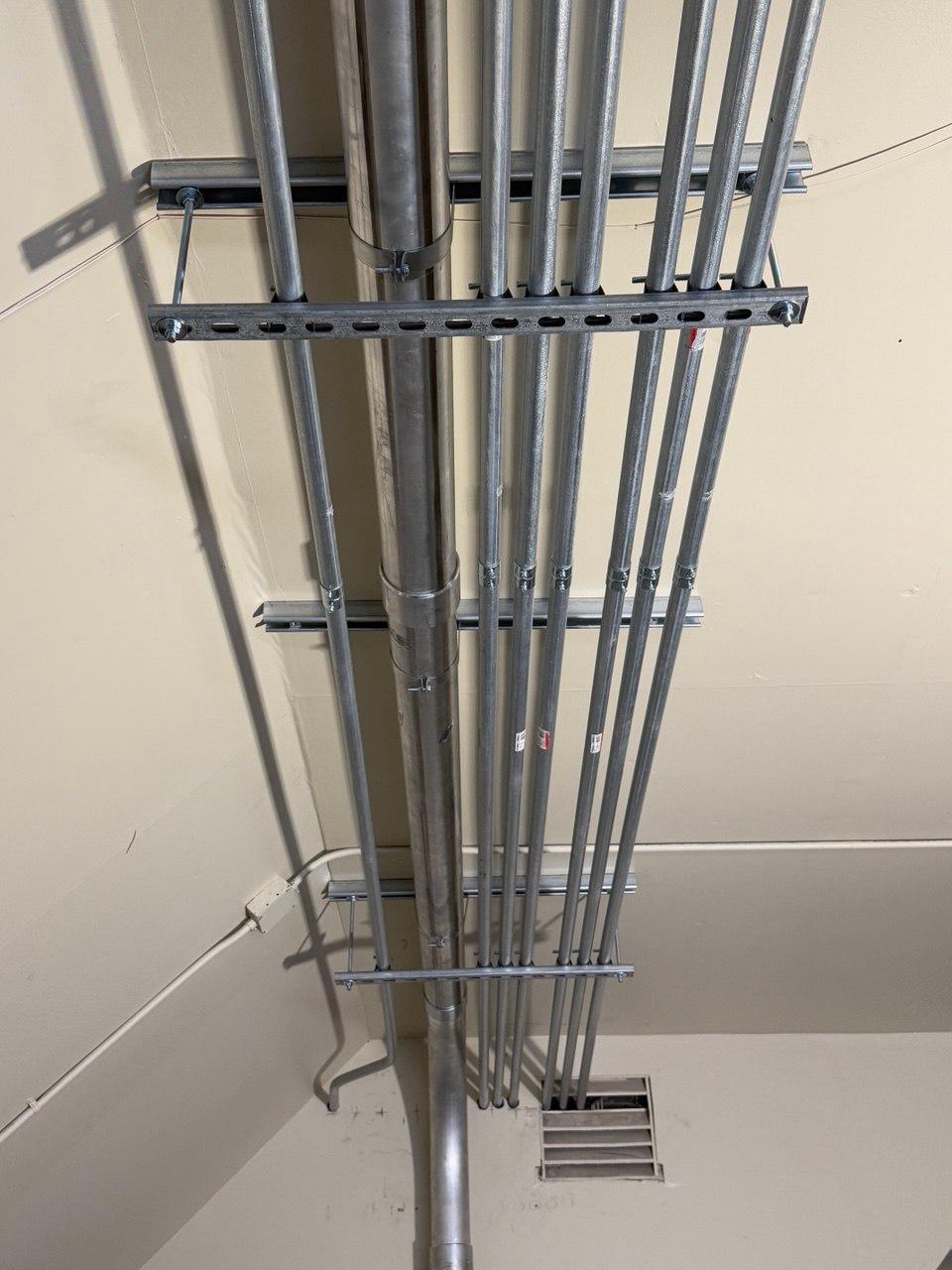 Organized conduit routing during multi-unit electrical upgrade project