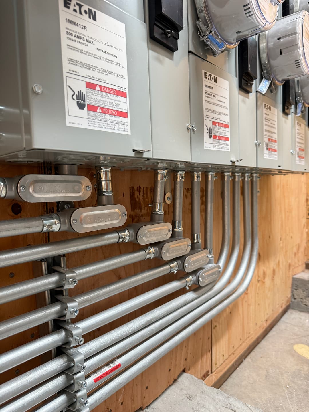Clean conduit bends and service equipment detail
