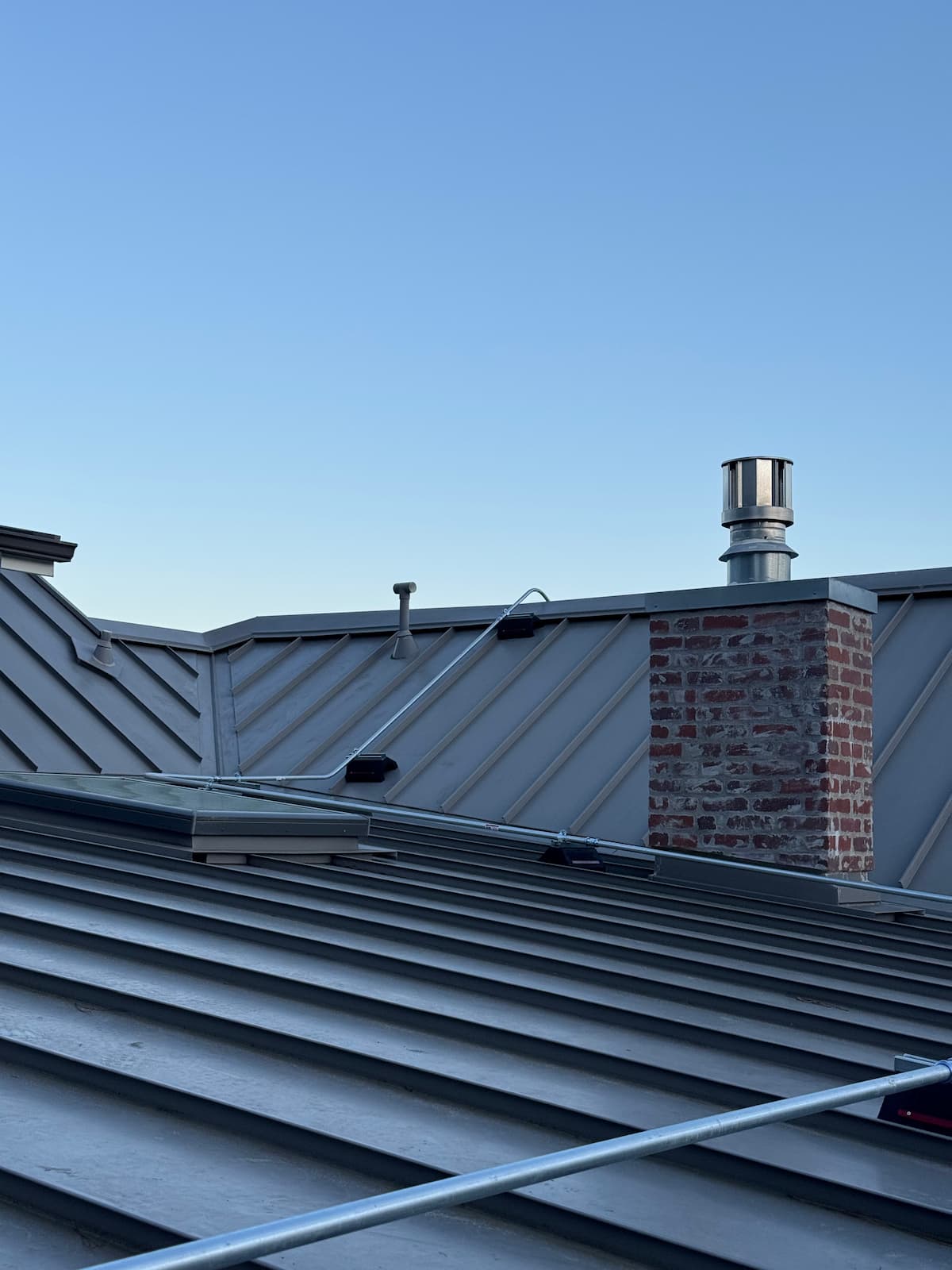 Concealed outdoor heater wiring near roof line
