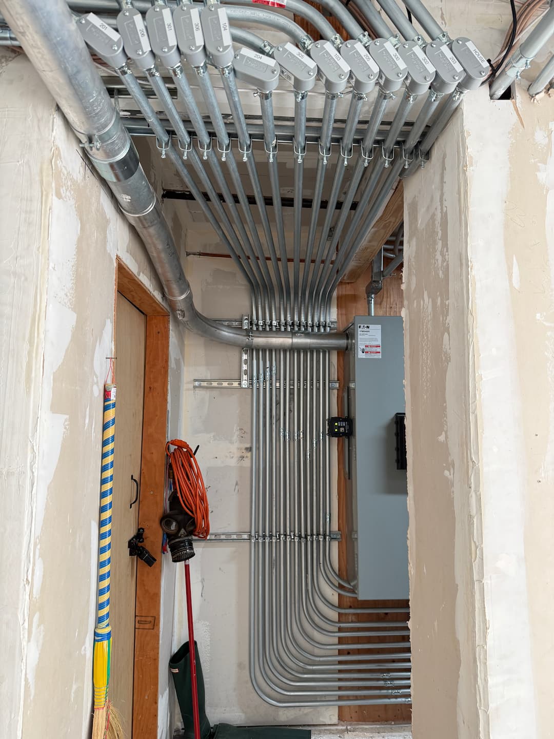 Electrical room conduit and service equipment for apartment building