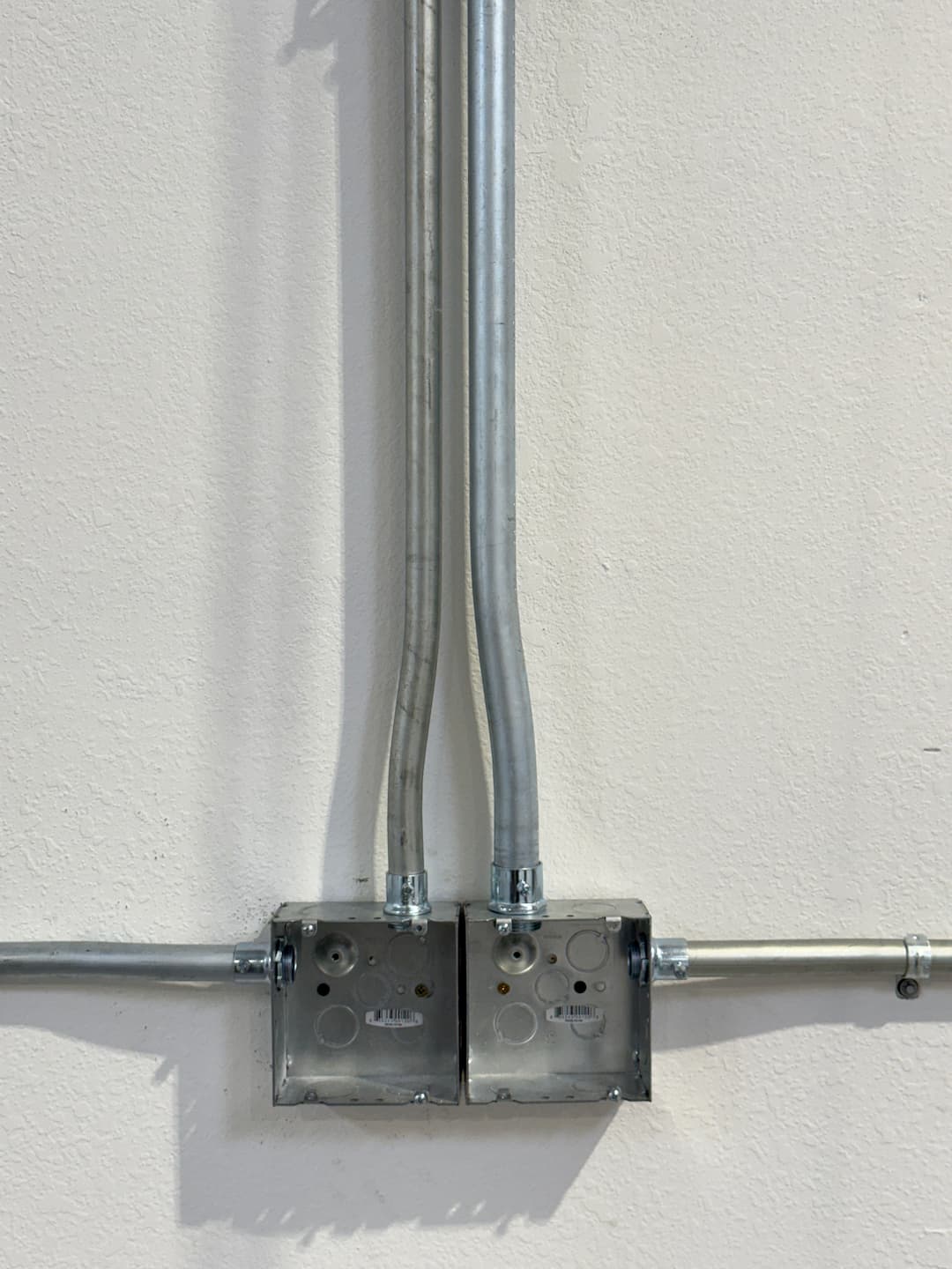 Finished conduit and junction box detail