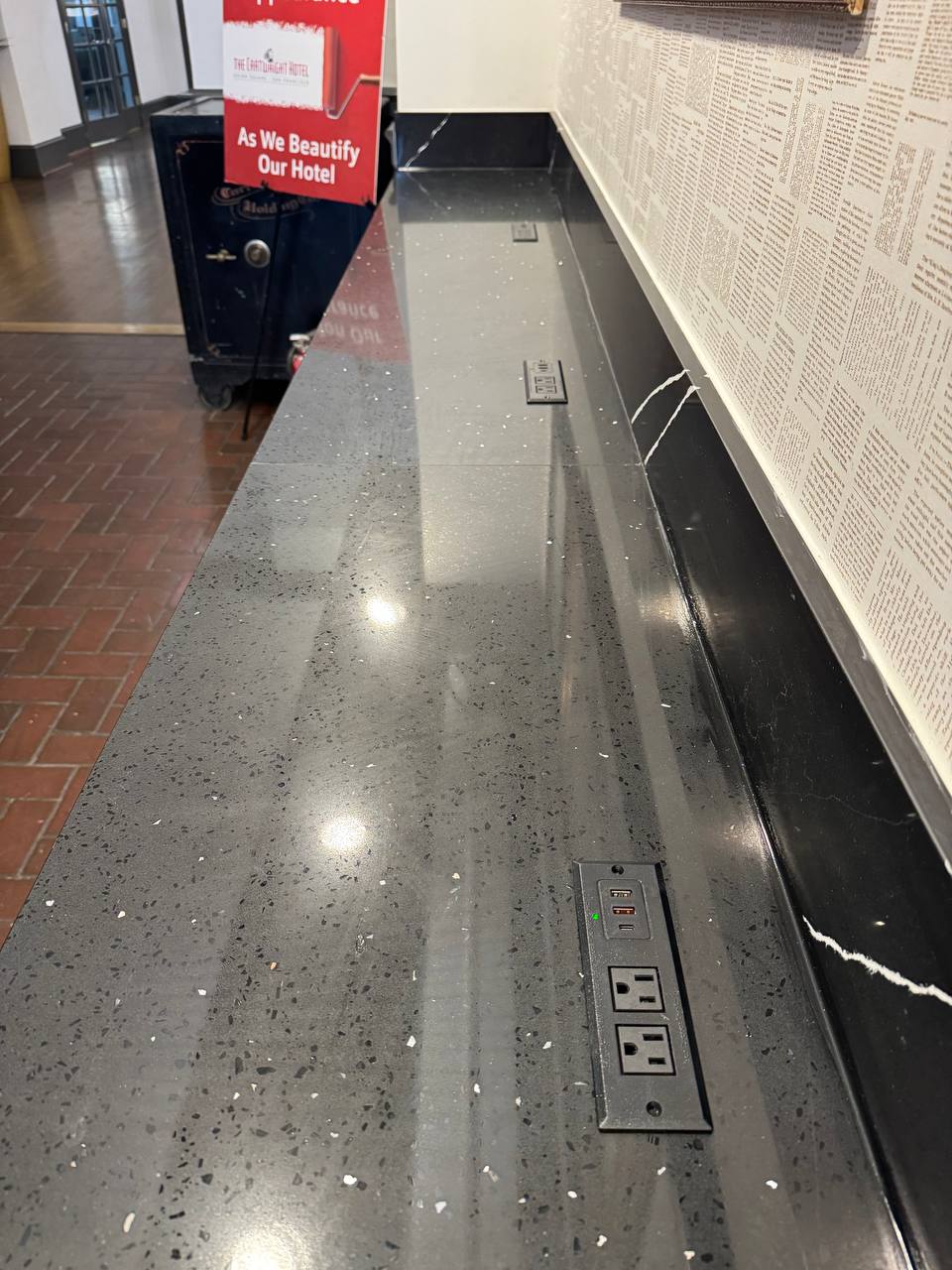 Countertop outlet installation in a historic hotel by Max Electric