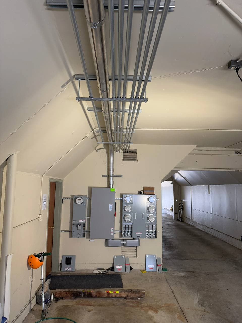 New service equipment location for six-unit apartment building