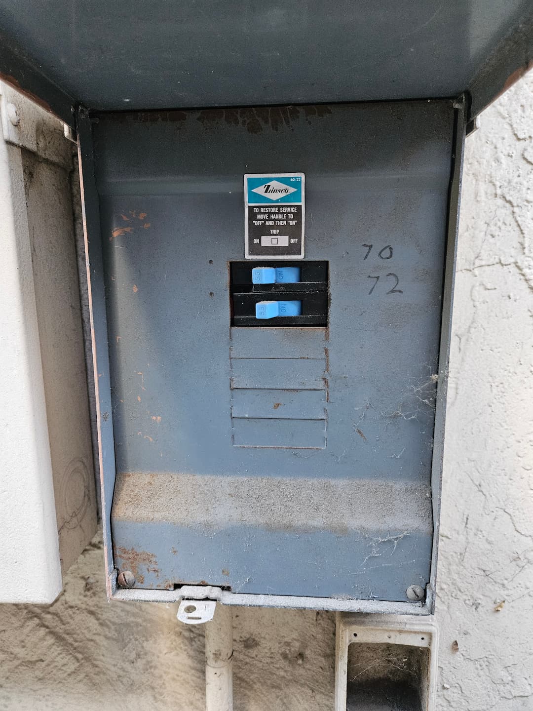 Outdated electrical panel before replacement in Oakland
