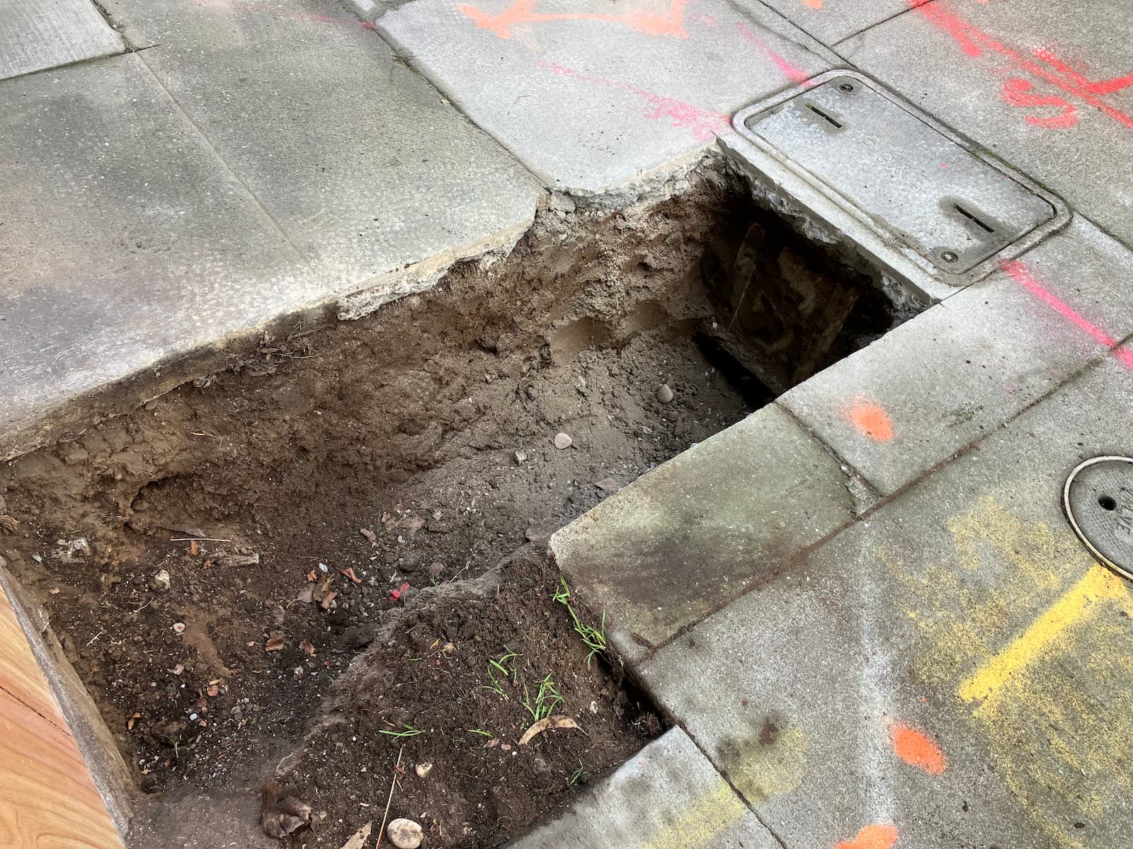 Excavation for secondary service box replacement during utility upgrade