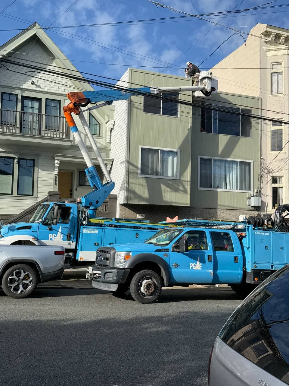 Utility coordination and service relocation with bucket truck