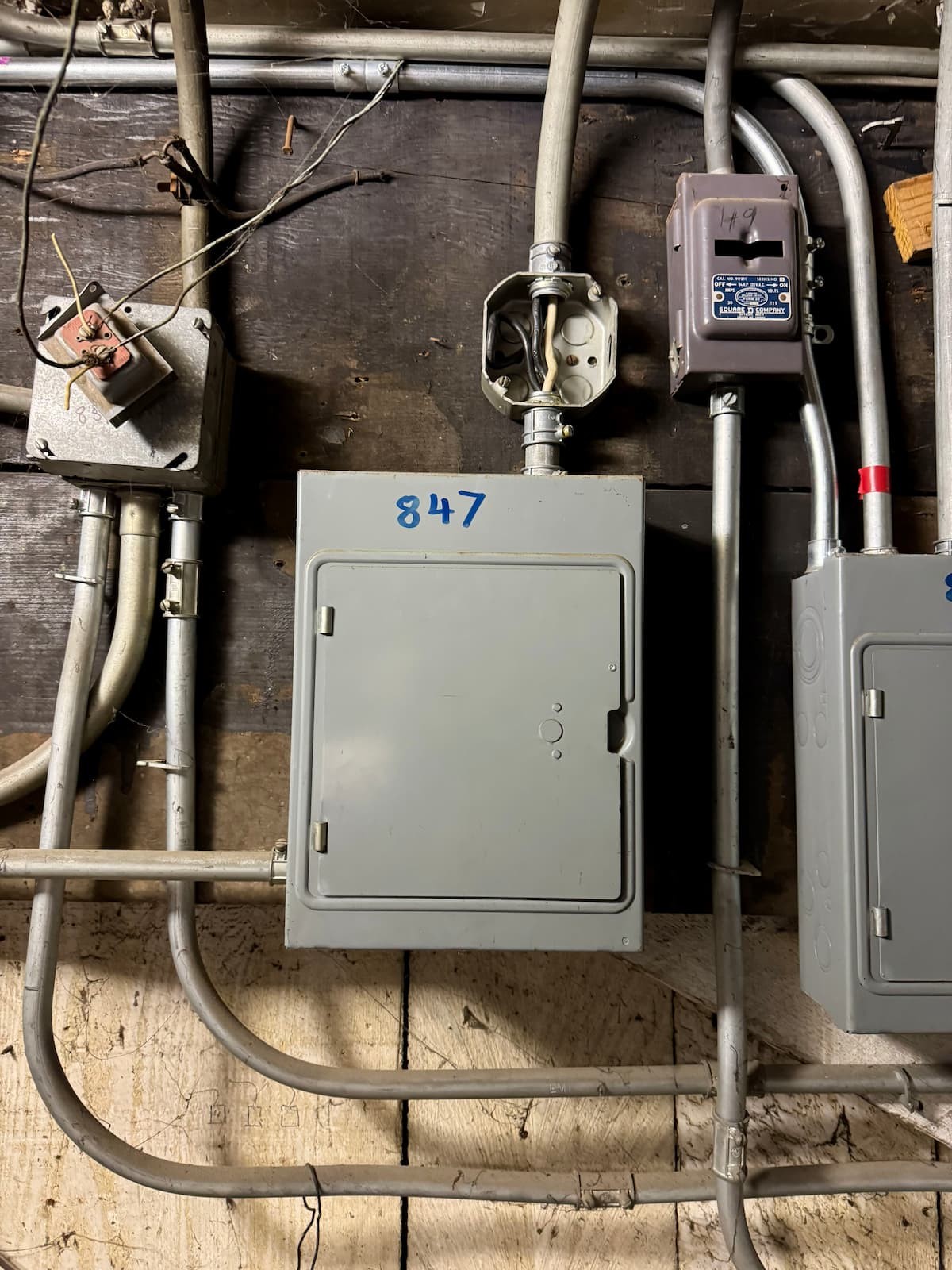 Compact utility room electrical panel replacement in a Victorian building