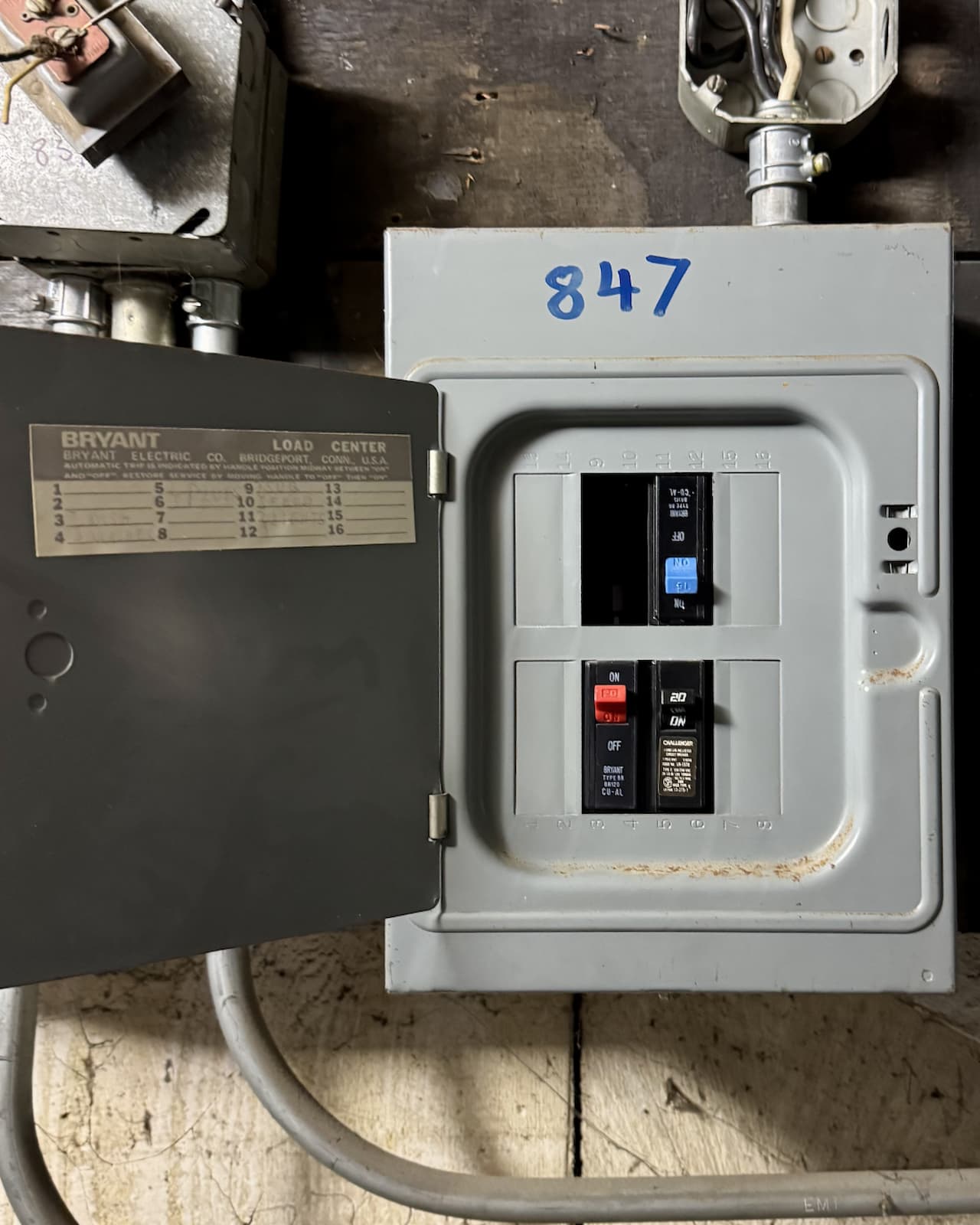 Open replacement panel in a compact utility room