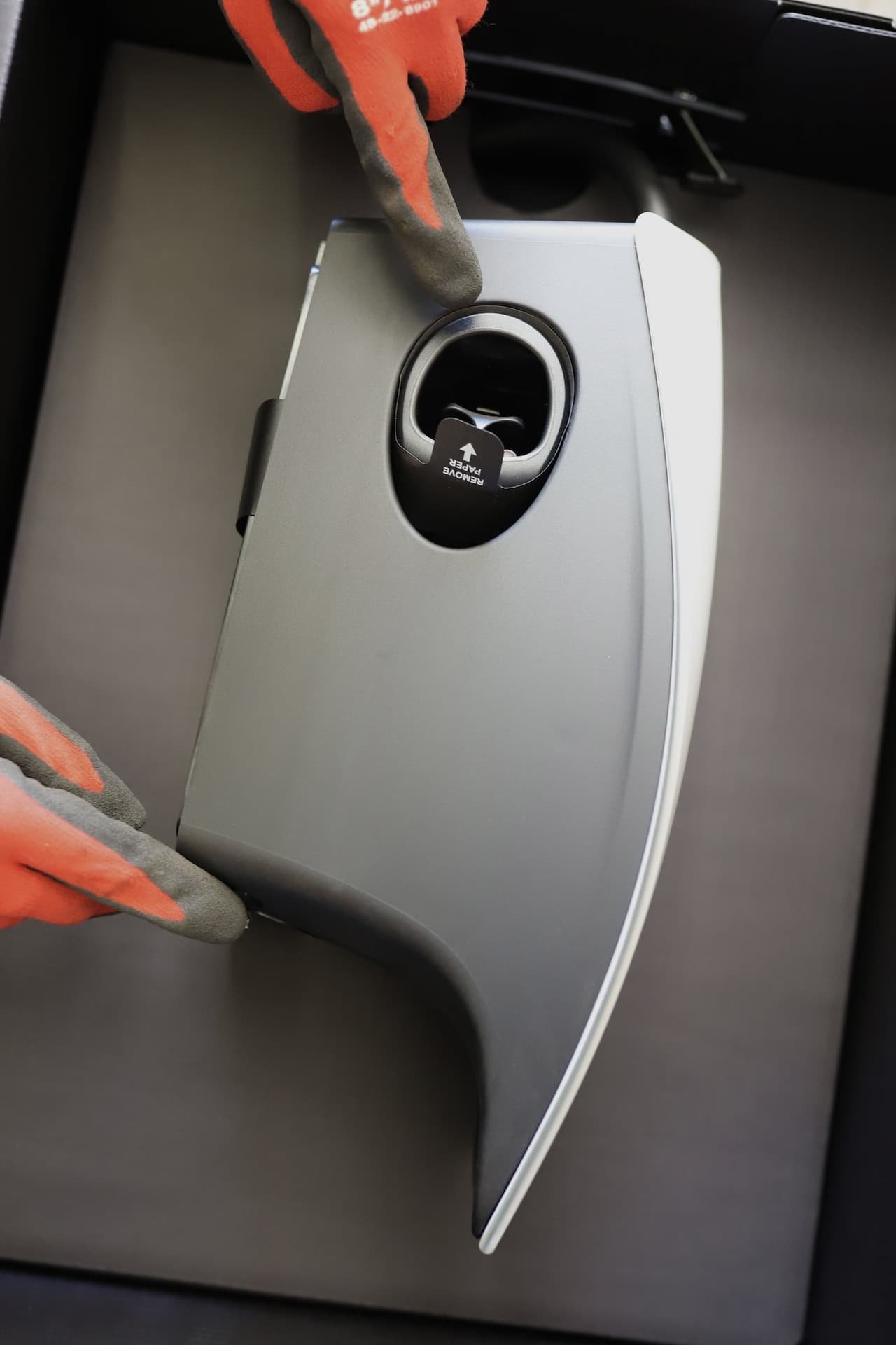 MaxElectric electrician preparing an EV charging connector